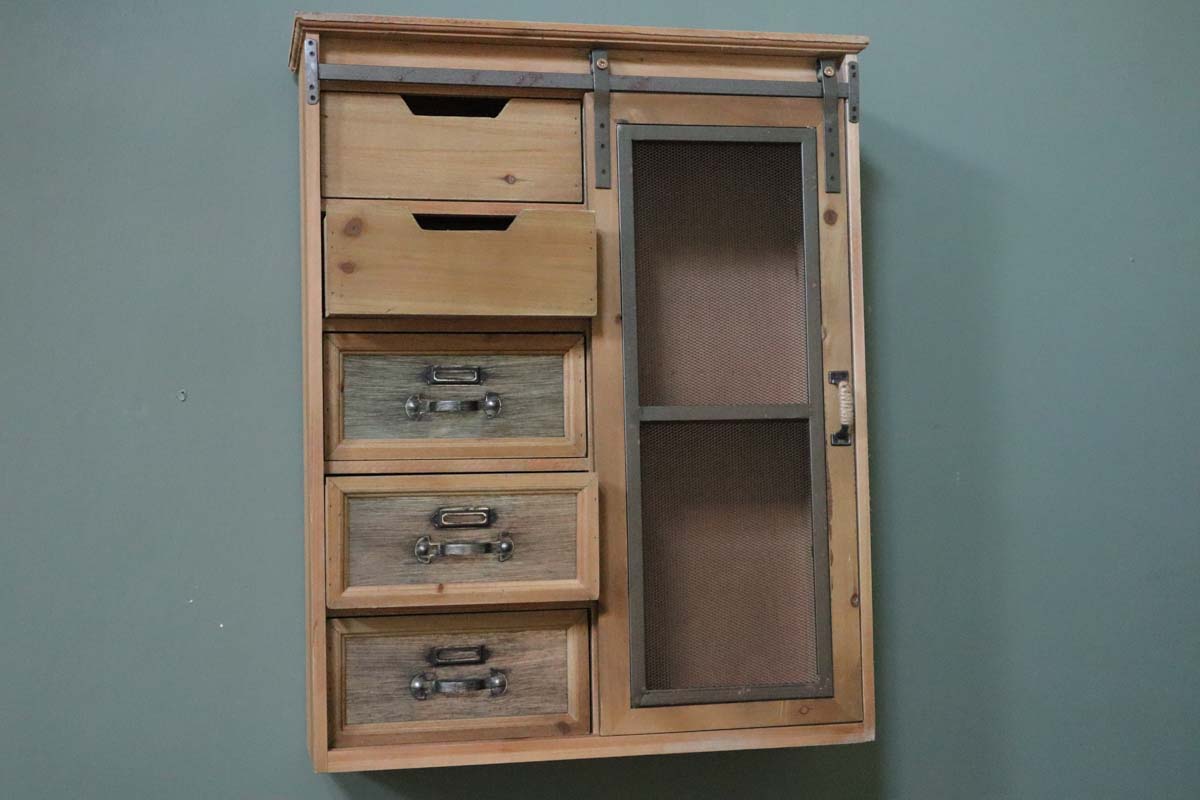 Wall unit with sliding door and drawers