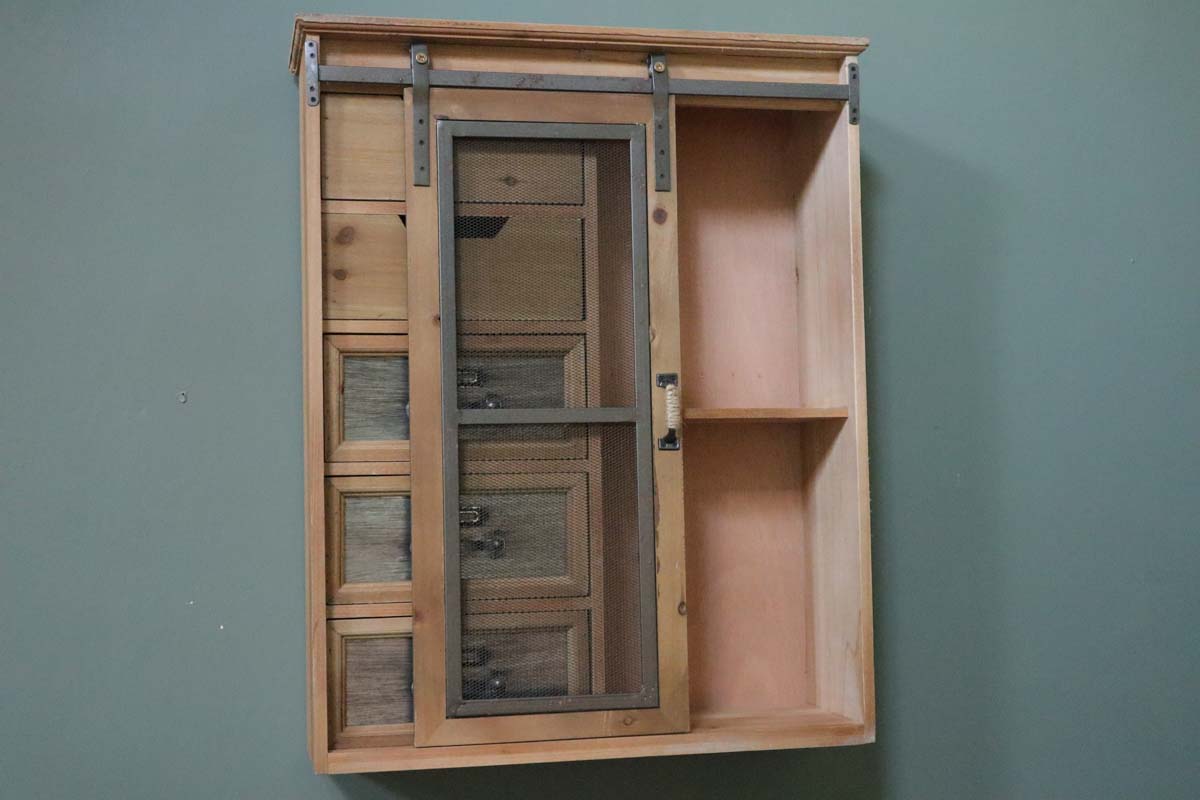 Wall unit with sliding door and drawers